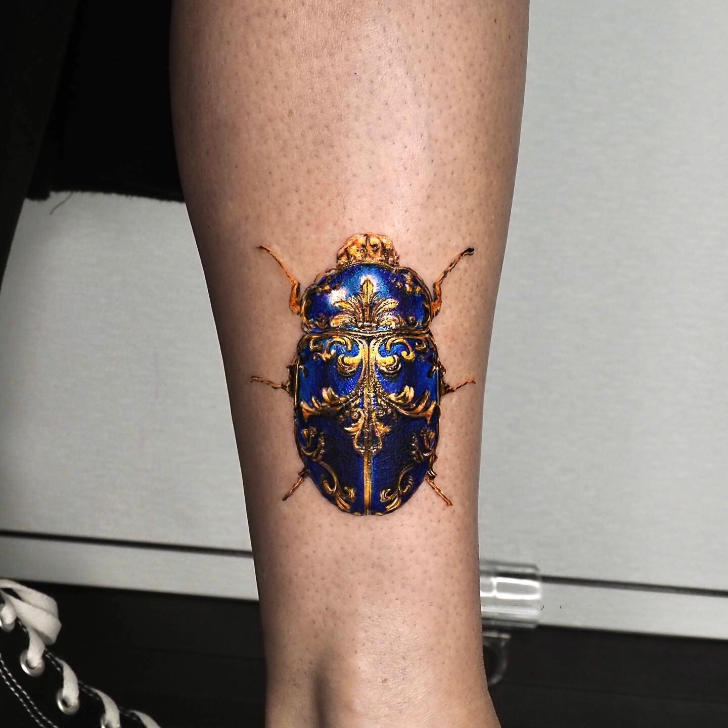 Blue &amp; Gold Beetle by Antonio 🪲 
&bull;
&bull;
&bull;
DM/Email or Call the shop to schedule your next appointment!
&bull;
&bull;
&bull;
#tattoo #tattoos #torontotattoo #torontoartist #artist #tattooartist #tattooshop #shop #art  #vaughan #vaugha
